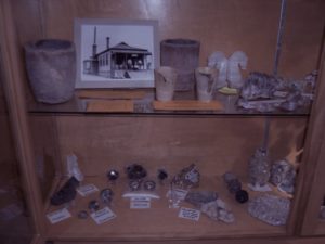 mineral specimens and an old photograph