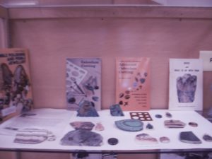Books about jewelry-making and mineral specimens